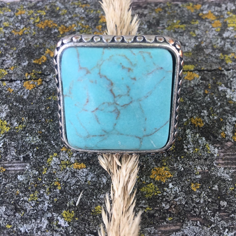 Stone statement ring.